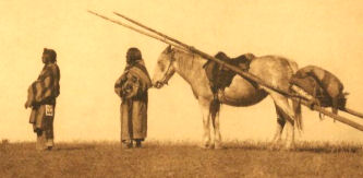 Blackfoot Couple with Horse and Travois Blackfoot Couple with Horse and Travois